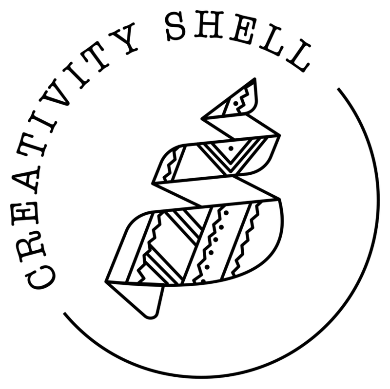 Creativity Shell logo: the words Creativity Shell arched over a patterned ribbon folded into an S, inside a circle