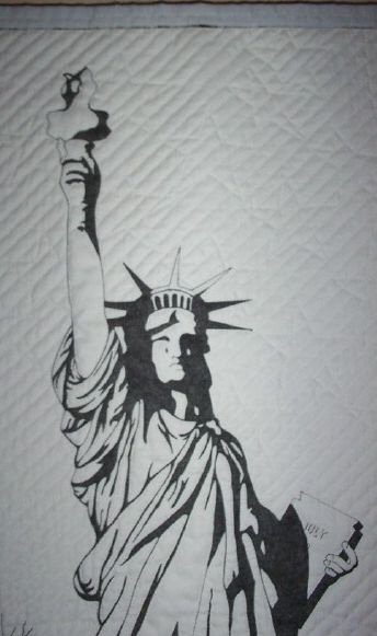 Detail of Remember Me showing the stitched Statue of Liberty